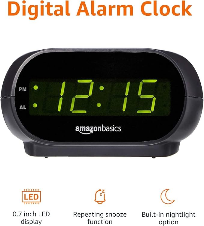 Amazon Basics Small Digital Oval Alarm Clock with LED Display, Nightlight, Snooze Function & Battery Backup, Black, 4.5 x 3.5 x 2.4 Inches hover